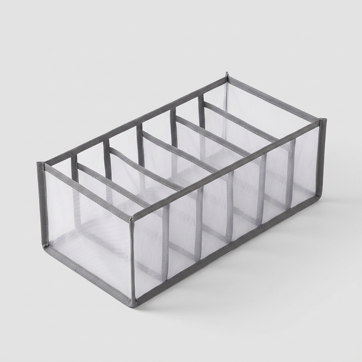 Organizador de gavetas em tecido para roupas íntimas com divisórias - vista frontal em fundo neutro