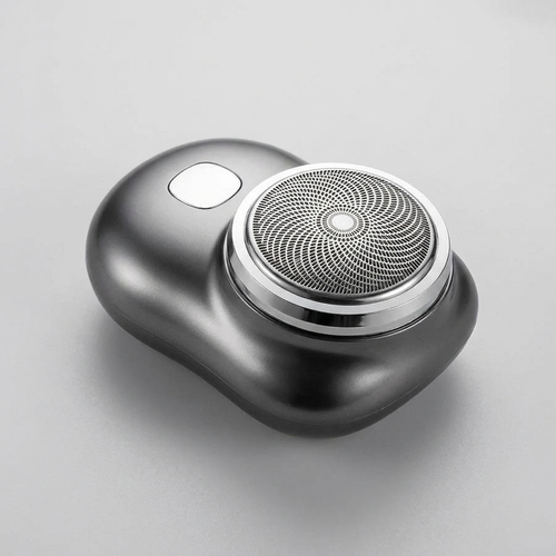 Barbeador elétrico portátil BarberFast à prova d'água - vista em ângulo em fundo neutro