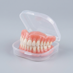 Dentadura de silicone AdaptaSmile com estojo de armazenamento em fundo neutro