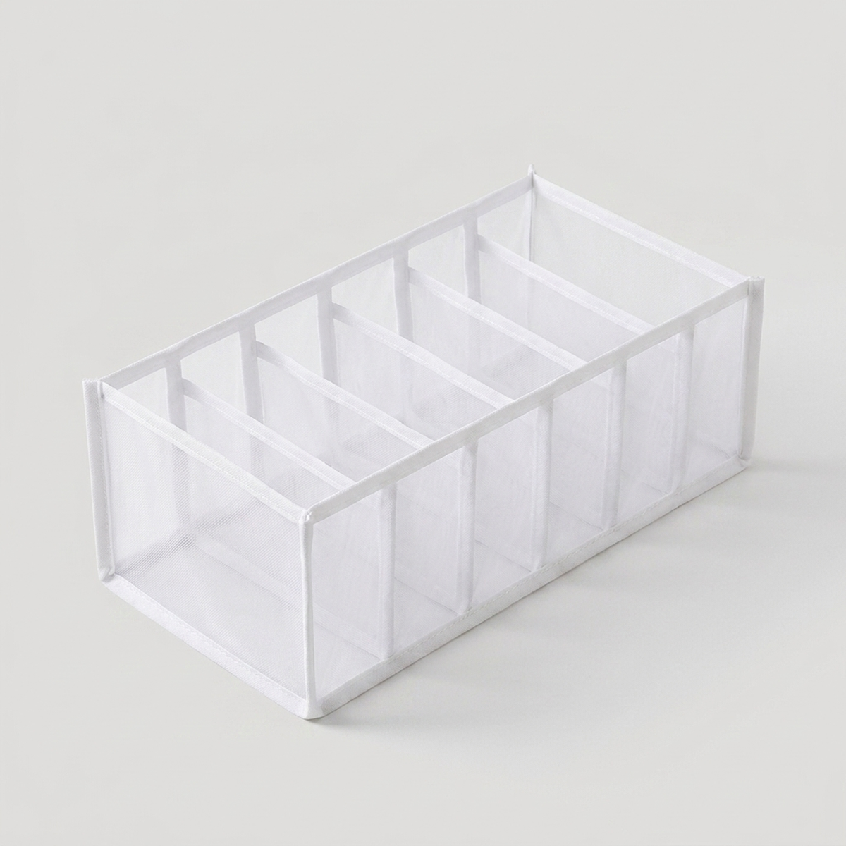 Organizador de Gavetas em tecido branco em fundo neutro