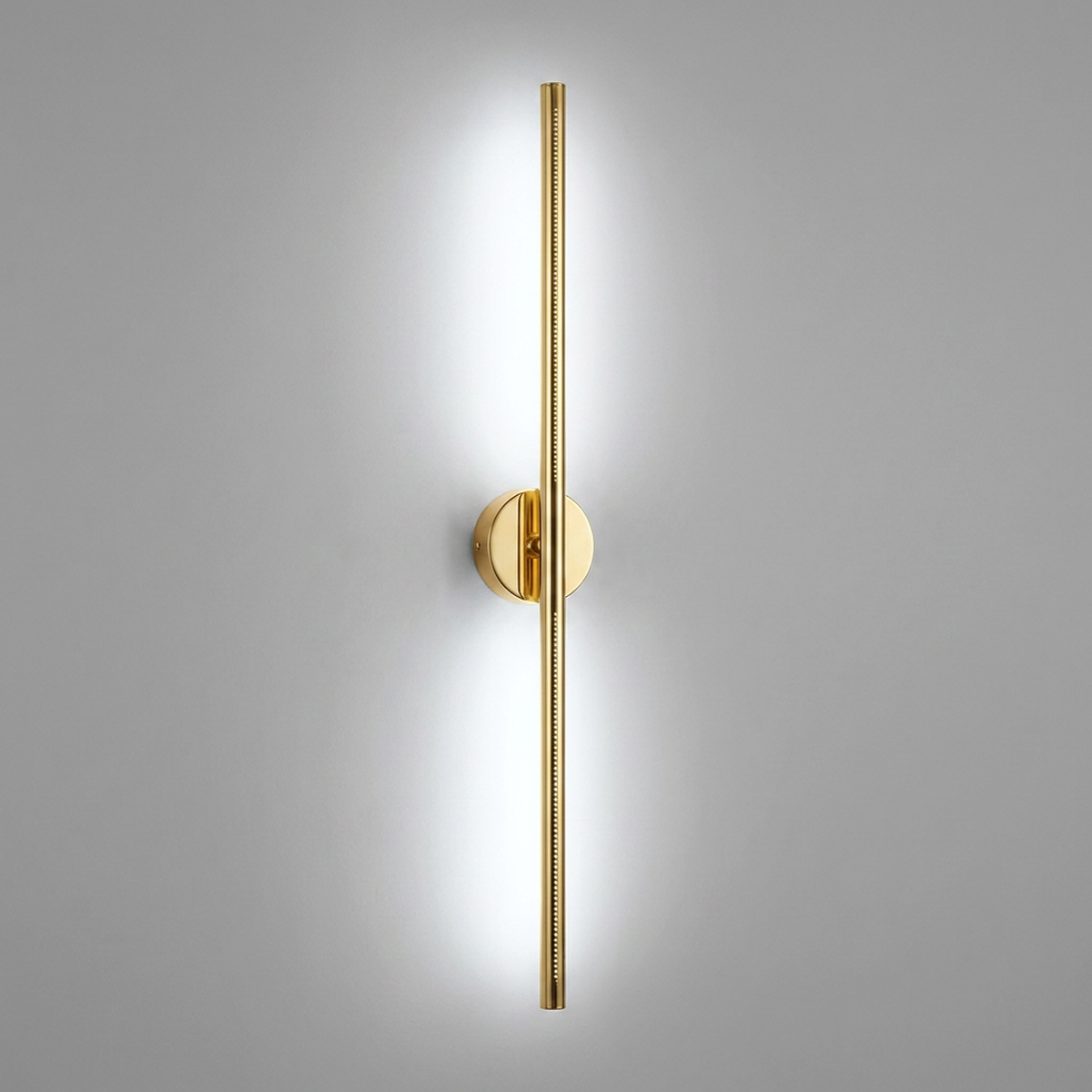 Arandela Ponto Lines dourada com luz LED branca em fundo neutro